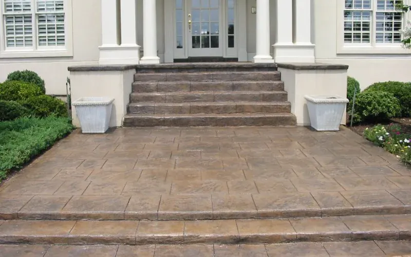Decorative concrete stained steps and porch.